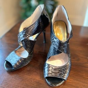 Michael Kors black snakeskin pattern leather heels with gold zipper